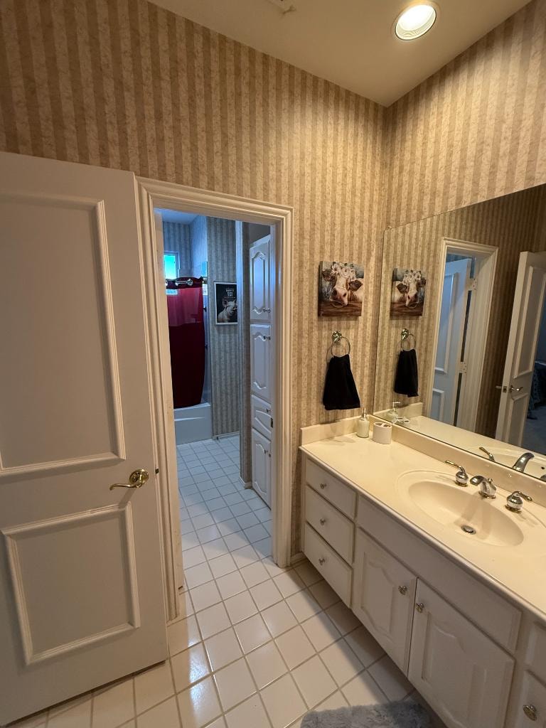 Private Suite Bedroom 5 — shared bathroom with double vanity
